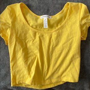 Yellow cropped short sleeve shirt